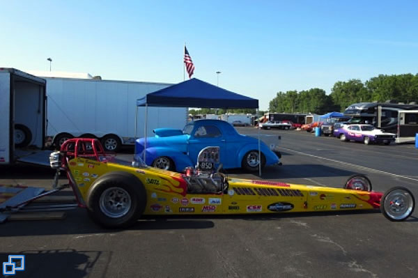 Dave Bommarito in his bright yellow Front Engine Dragster