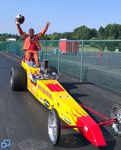Dave Bommarito in his bright yellow Front Engine Dragster