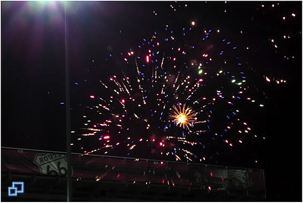 Fireworks over the grandstands punctuate the end of a good day of racing. 